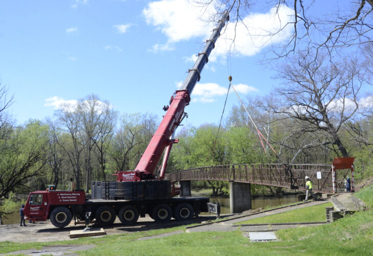 Work ramps up on pedestrian bridges at parks in Warren